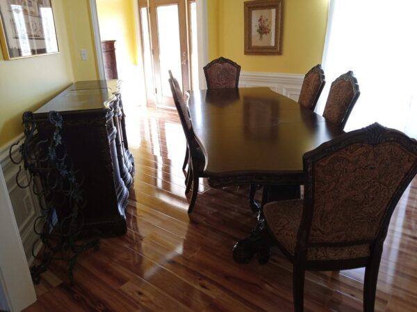 wooden dinning furniture set -moved and setup by furniture movers in a home near Madison, AL 35756.